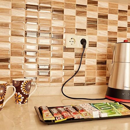 Bursa Suites Apart Otel 外观 照片 A kettle plugged into a wall socket